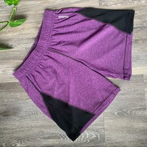 Reebok women’s athletic shorts, purple, size small